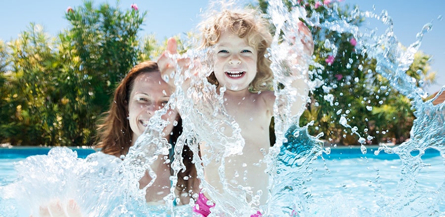 Woman and girl in a pool