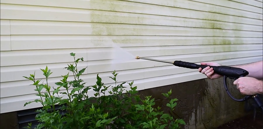 Man cleaning his house.