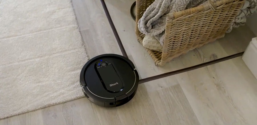 Shark IQ Robot XL cleaning the bedroom.