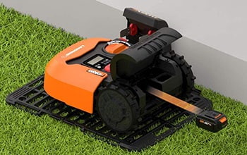 Battery and a battery compartment of a robot mower.