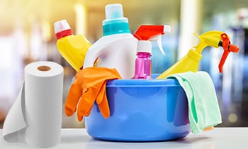 Bucket of supplies for window cleaning.