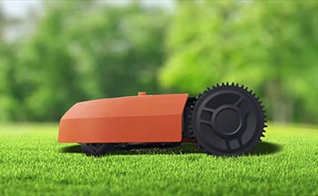 A robotic lawn mower cutting grass.