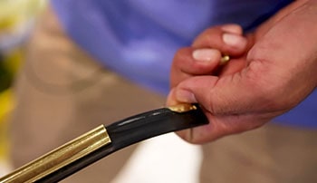 Man replaces blade in the squeegee