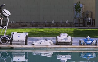 Iconic models of all major automatic pool cleaner types are standing near the pool