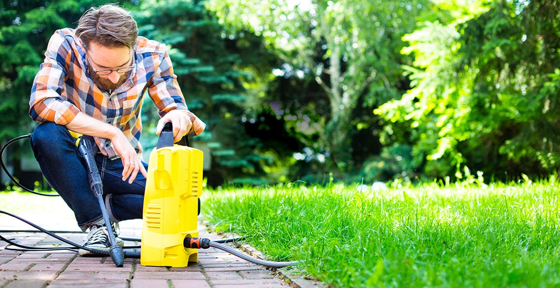 Man wondering why his electric pressure washer no longer works