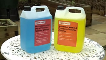 Pressure washer detergents are standing on the table.