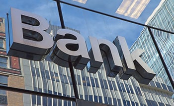 The glass wall with the inscription Bank.