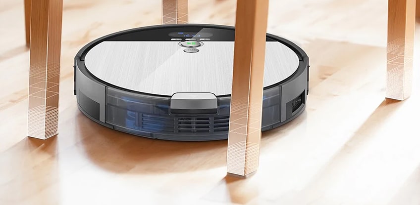 ILIFE V8s is cleaning the floor between chairs