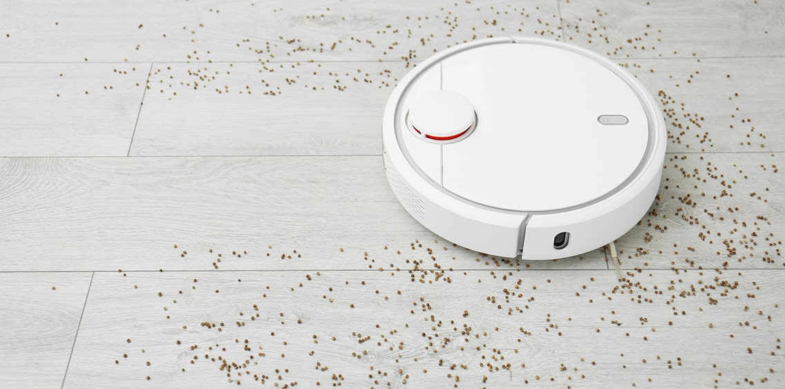 Robot vacuum cleaner is cleaning the floor