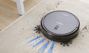 ECOVACS DEEBOT N79S is cleaning the floor with powerful suction
