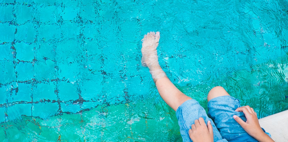 Woman is near the cold pool