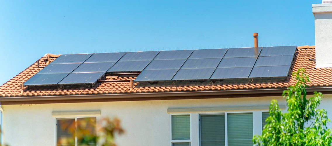 Solar-powered heaters on the roof of the house
